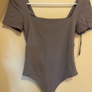 Aritzia Taupe v-neckline Bodysuit